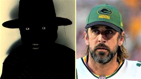 Aaron rodgers black hat man. GREEN BAY, WI- Not much is known of the mysterious “Hat Man” except that Aaron Rodgers first started seeing the shadowy figure after his Ayahuasca fueled trips in Peru during the 2020 and 2022 offseasons. Aaron says “He will sometimes appear in the distance usually veiled by darkness holding the corpse of a dead rabbit and sometimes a blade.” 