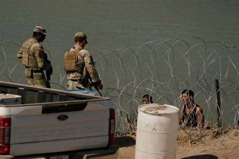 Abbott responds to report that troopers and soldiers were ordered to deny migrants water, push children into Rio Grande