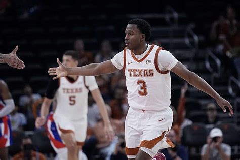 Abmas has 16 points and seven assists to lead No. 12 Texas past Houston Christian 77-50