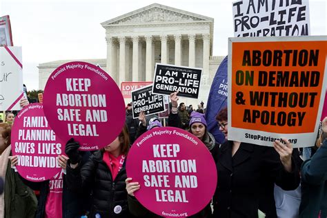 Abortion rights advocates clash with anti-abortion supporters on advice to expecting women