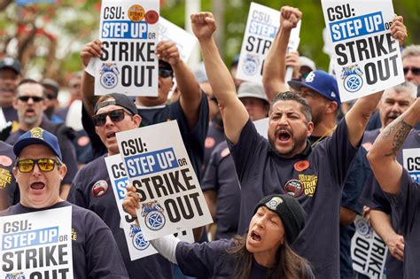 About 13,000 workers go on strike seeking better wages and benefits from Detroit’s three automakers