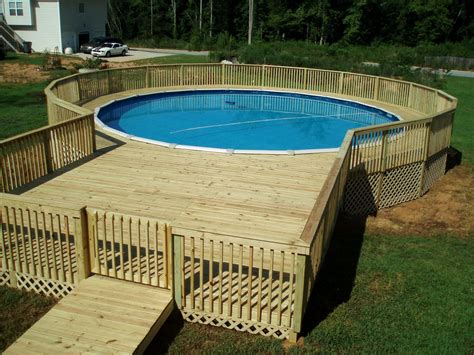 Above ground pool decks. And, as you can see, our pool is perfect as a semi in ground pools for sloped yards. Our classic rectangular on ground pools will surely enhance your yard-scape and become an elegant architectural addition to your backyard … that can only be an Aqua Star Deck-Pool. Contact us for the Aqua Star pools dealer nearest you. 734-765-2700. 
