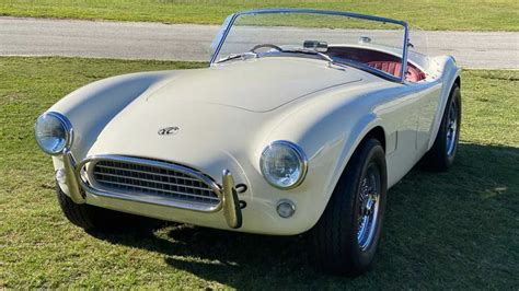 Ac cars. Published on May 15, 2023. By Bryan Hood. AC Cars. One of the most revered sports cars of the 1960s is back. AC Cars unveiled the new Cobra GT Roadster late last week. The sporty two-seater isn ... 