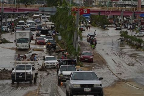 Acapulco residents are left in flooded and windblown chaos with hurricane’s toll still unknown