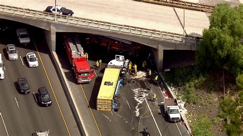 This aerial image taken from video provided by ABC7 Los Angeles shows the scene of a crash on Interstate 710 in north Long Beach, Calif., Monday, June 26, 2023. Five people were killed and one was .... 