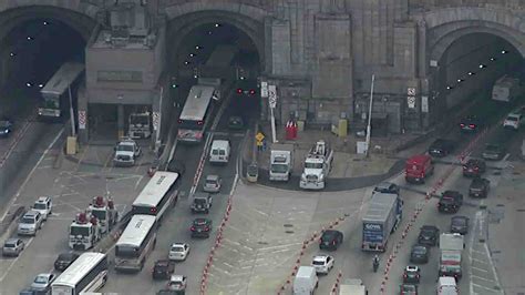 With the outbound Lincoln Tunnel closed, cars were being diverted for several hours to the Holland Tunnel and the George Washington Bridge, causing widespread backups on Manhattan's West Side.. 