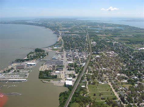 Port Clinton is located at the mouth of the Portage River on Lake Erie, about 44 miles east of Toledo. Port Clinton's economy benefits from its lakefront situation, with its fishing, boating, and recreational tourism industries providing employment opportunities to many locals. Port Clinton and surrounding attractions in Ottawa and Erie .... 