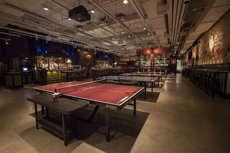 Acebounce. AceBounce has more than a dozen ping-pong tables, an extremely well-stocked bar, and a full-service restaurant with elevated bar food like fried oysters and lamb kebobs, plus a full pizza menu ... 
