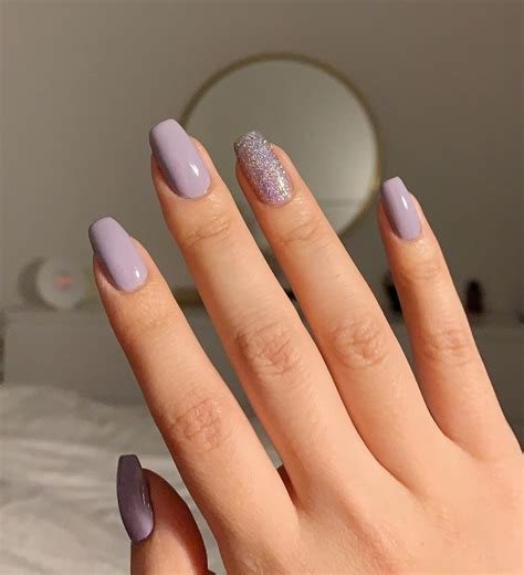 Here are the 8 best coffin-shaped purple nail designs. 1. Li