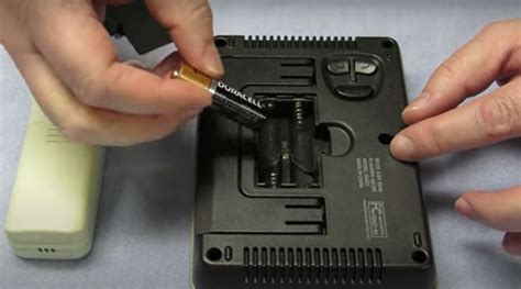 Slide off the battery compartment cover. Take note of