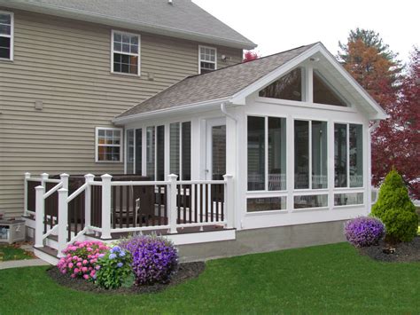Add sunroom. You can easily add a sunroom to your porch or deck, and we can work with you to create the perfect sunroom. As you can see here, you can still have an outdoor space in addition to your sunroom. At Patio Enclosures we use 1-inch thick, double pane, insulated glass in our glass rooms to make heating and cooling the space as easy as … 