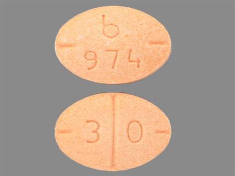 Pill with imprint b 974 3 0 is Orange, Oval and has been identi
