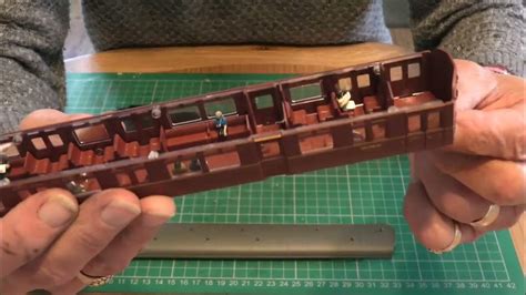 Adding lighting, people and steel wheels to a Hornby Autocoach.