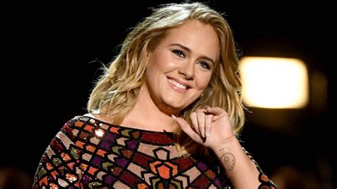 Adele poses in bikini inside her garden following huge …