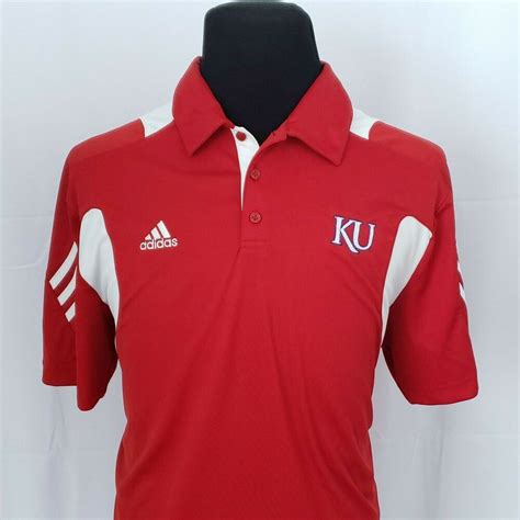 A classic look to honor KU. This adidas polo shirt is made of soft and stretchy fabric to let you move freely. AEROREADY helps keep you dry as you put in the work. The Jayhawks graphic lets everyone know who you support. Made with a series of recycled materials, and at least 70% recycled content, this product represents just one of our solutions to help …. 