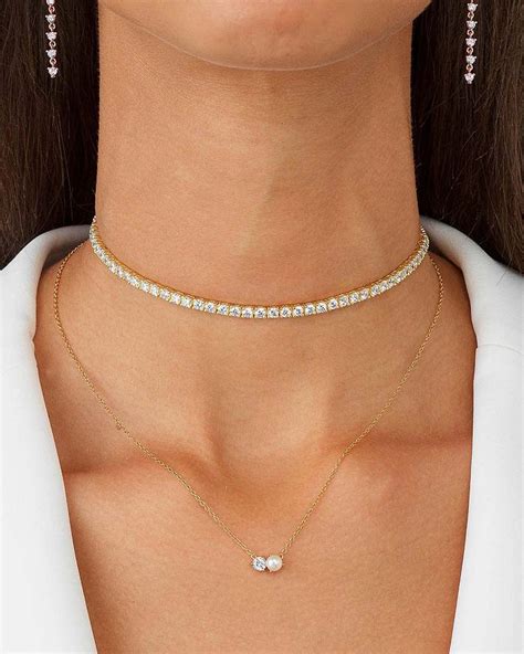 Adina jewelry. Not hearted. Adina Reyter 14k Diamond Cluster Half Riviera Necklace $3,798.00. Not hearted. Adina Reyter 14k Pearl + Diamond Amigos Posts $598.00. Not hearted. Adina Reyter 14k Large Double Wide Pavé Ear Cuff $598.00. Not hearted. Adina Reyter 14k Celestial Diamonds Wide Huggie Hoops $698.00. Not hearted. 