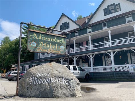 Adirondack hotel. A brief history of the Adirondack Hotel. While at the Adirondack Hotel, it’s impossible to escape its history: The original hotel, Kellog’s Lake House, was built in 1850. It burned to the ground in 1898. According to the Adirondack Hotel’s website, the owner at the time, John Anderson, rebuilt the hotel in 1899. 