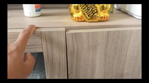 How to install cabinet door knobs evenly so they aren't misaligned. This home improvement tutorial shows you the tools and techniques you can use to install...