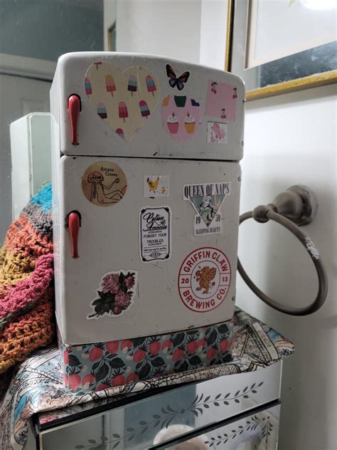 Adorable vintage toy fridge turned into perfume storage!