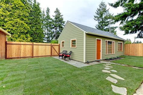 An accessory dwelling unit is a separate living unit on the grounds of a single-family home. It must have a separate entrance and its own kitchen (or kitchenette), full bathroom, and living and sleeping space. Some homeowners use ADUs as in-law units to house relatives under a conveniently separate roof..