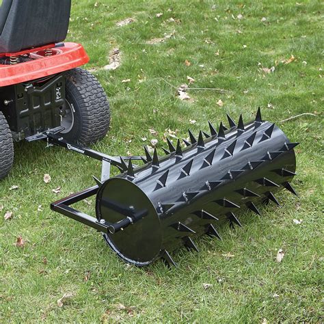 Aerator for lawn. Spike aerators use a series of rotating star-shaped tines that slice into the soil. This allows seed, fertilizer, water, air, light and nutrients to reach the grass roots. Aerating should be done when the lawn's moisture content is high. the 40 in. spike aerator provides up to 2.5 in. of aeration depth by adding up to 100 lbs. to the weight tray. 