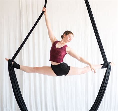 Aerial fabric dance classes. 2. Aerial Silks: Dance of Grace and Flexibility. Picture this: artists wrapped in cascading silks, twirling and contorting in mesmerizing patterns high above the ground. Aerial silks, also known as aerial fabric or tissue, … 