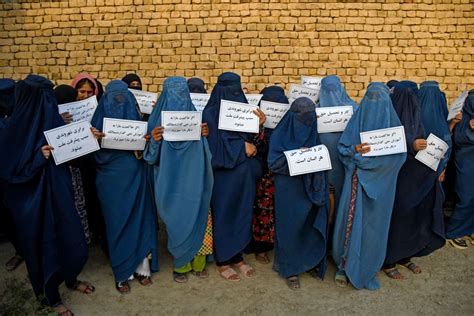 Afghan universities ready to readmit women but not until Taliban leader says it’s ok, official says