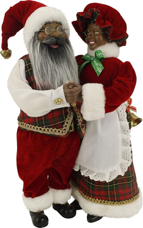 African American Mr And Mrs Santa Claus, Claus, from The Holiday Aisle®,  will fill your home, office, or shop with holiday cheer.