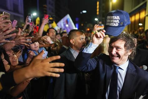 After presidential race surprise, Argentine economy minister and right-wing populist look to runoff