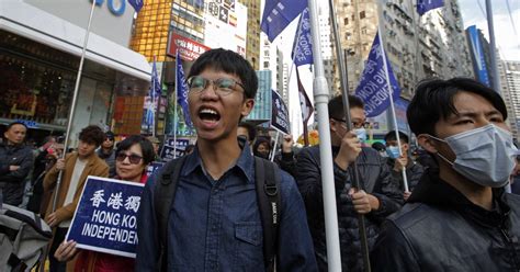 After serving jail term over security law, a Hong Kong pro-independence activist seeks asylum in UK