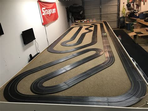 All AFX track is interchangeable, so expand your Infinity set to your heart’s content. Or, “graduate” to an expert track like the 62.5 ft. Giant Raceway or the 4-lane Super International. Fun Fact: The “N” button on the real life F1 car bodies disengages the clutch to allow the car to roll.. 