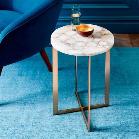 The top is made from pieces of natural agate. It is designed with a sturdy metal base. ... West Elm; World Market; ... Dining tables; Dining sets; Side & end tables .... 