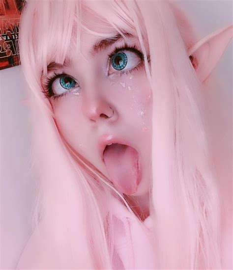 Ahegao. Ahegao is a term in Japanese pornography for an exaggerated facial expression; rolling/crossed eyes + protruding tongue + optionally a slightly reddened face. This to show sexual enjoyment or ecstasy. 