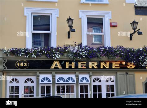 Ahernes - Caroline Aherne. Caroline Mary Aherne [1] (24 December 1963 – 2 July 2016) was an English comedian and BAFTA Award -winning writer and actress. She grew up in Wythenshawe. She was best known for performing as the chat show host Mrs Merton. She was also known for her roles in the The Fast Show, and as lead in the The Royle Family, …