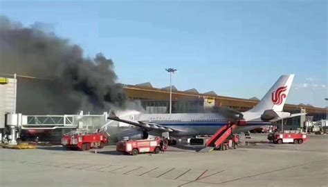 Air China jet evacuated after engine fire sends smoke into cabin in Singapore, and 9 people injured