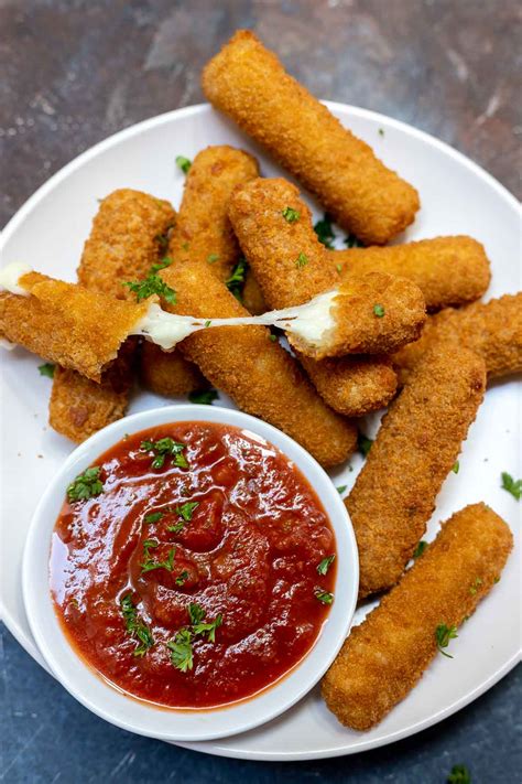 Air fry mozzarella sticks. Air Fryer Mozzarella Sticks: Heat to 375 degrees and cook for 8 minutes, turning halfway through. Deep Frying: Fry the sticks directly from frozen for 3-4 minutes or until golden brown. *Please note that I had the most success with the pan frying method. Both baking and the air fryer method yielded some … 