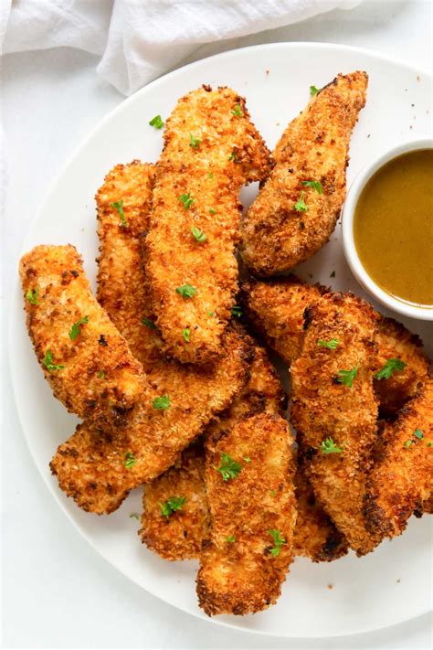 Air fryer chicken tenders with flour. Method. To marinate the chicken, combine the garlic with the yoghurt and salt. Cut the chicken into roughly 3cm/1¼in wide strips and marinate in the yoghurt mixture for at least 20 minutes, or ... 