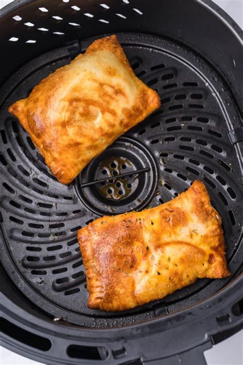 Air fryer hot pockets. Dec 20, 2022 ... Slice in half widthwise and lengthwise for a total of four rectangles. Spread sauce onto two rectangles, leaving 1/2-inch borders. Top with ... 