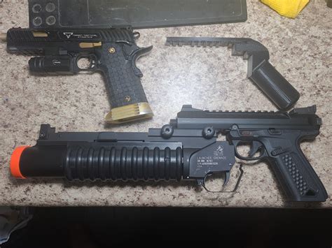 Airsoft underbarrel attachments.  This kit comes with everything you need to get start...