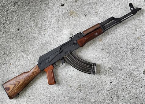 The AK-47 is the most mass-produced assault rifle in history with over 75 million produced to date and is still used today by military forces worldwide. The original rifle was designed with two different types of stocks: one version with a fixed wood stock and the other with a foldable metal stock. Now, there have been over 20 variants of the .... 