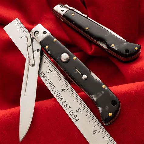 The Roma is great for any collection and/or for EDC use. The blade is stamped with "AKC World" Features Overall Length: 11.0" Blade Length: 4.625" Blade Material: 440A Blade Thickness: 0.12" Handle Material: Snake Wood Weight: 7.0oz Closed Length: 6.0" Knife Category: Automatic Action: Push Button, Lock Back Blade Style: Drop Point Country of ...