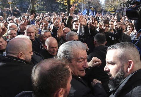 Albanian lawmakers discuss lifting former prime minister’s immunity as his supporters protest