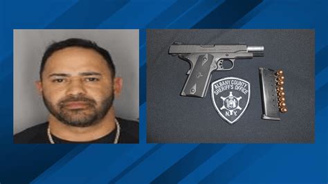 Albany man arrested for possessing illegal handgun
