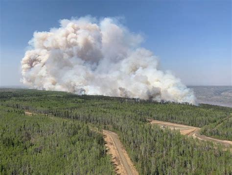 Alberta officials say cooler weather and showers help in battle against wildfires