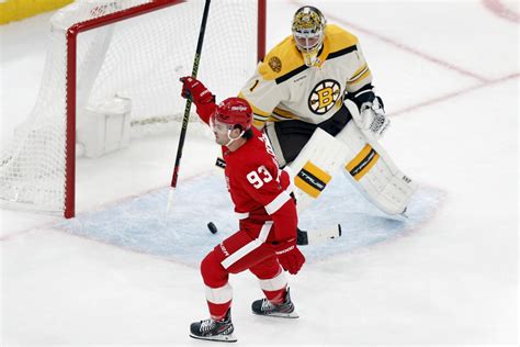 Alex DeBrincat leads Detroit Red Wings past Boston Bruins 5-2