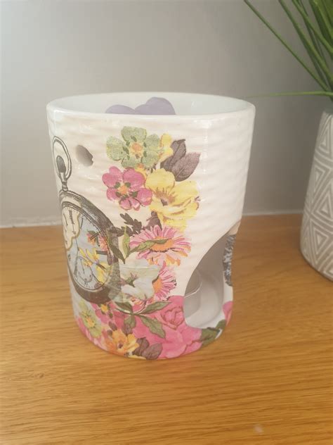 It’s a mad tea party! Modeled after three stacked teacups in the grand, imaginative style of Disney’s Alice in Wonderland, this warmer features a “cup” for e.... 
