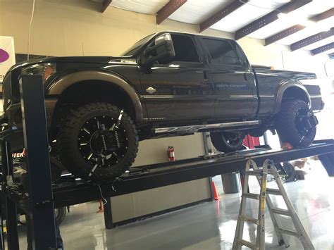 This shop is a specialized truck shop that deals with lifted and modified trucks all day. If this doesn't go well, I will definitely be interested in the lifetime alignment deals as well, since this truck has been on the alignment rack 5 times (two different shops / 2 different occasions) in the last 6 months.. 