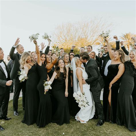 All black wedding dress code.  This can include black dresses, suits, tuxed...