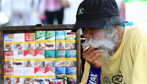 All cigarettes in Thailand sold in drab packaging …