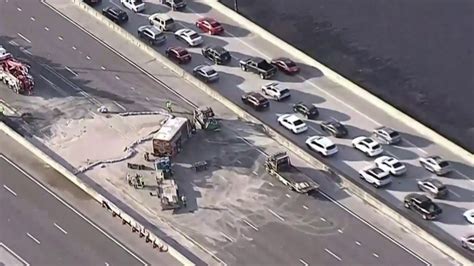 All lanes blocked on I-595 West near Nob Hill Road in Davie after tanker rolls over, catches on fire